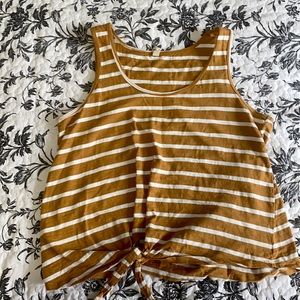 Mustard yellow and white striped tank top.